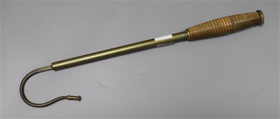 A Victorian brass and steel gaff, with ring turned handle, 46cm